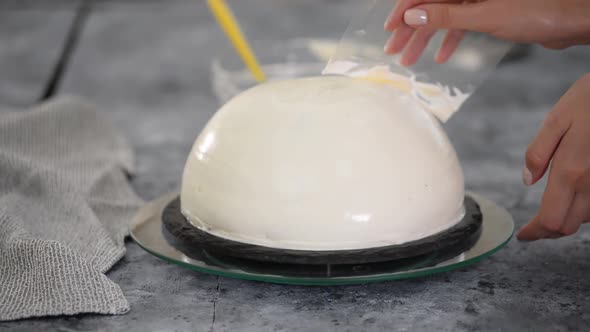 Close Up of Woman Preparing Cake with Vanilla Cream at Home. Making Pancho Cake with Sour Cream.