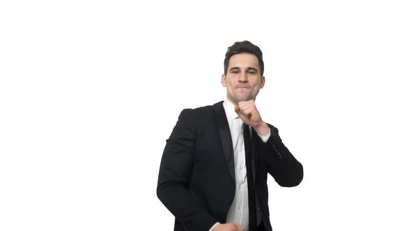 Slow-motion Happy Businessman Dancing in Smart Suit Isolated Over White Grey Background.