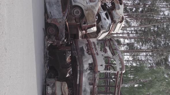 Vertical Video Irpin Ukraine  Burnt and Destroyed Cars