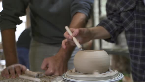 Making a Handmade Clay Pot in the Workshop. Pottery Lesson with Master.
