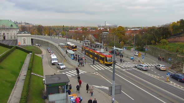 Busy Movement of Transport and Inhabitants on Main City Street on Monday Morning