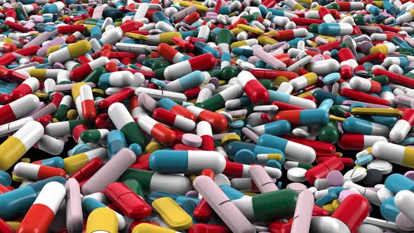 Pile of Different Colors Pharmaceutical Capsules and Pills Closeup, Dolly Move