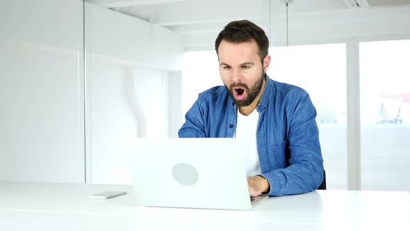 Beard Man at Work Gesturing Business Loss Tragedy