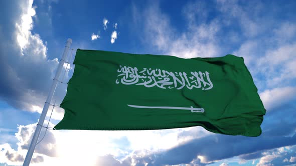 Realistic Flag of Saudi Arabia Waving at Wind in Slow with Blue Sky
