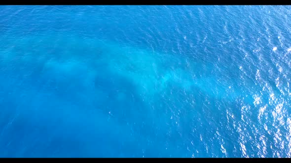 Aerial drone panorama of tropical sea view beach trip by blue lagoon with white sandy background of 