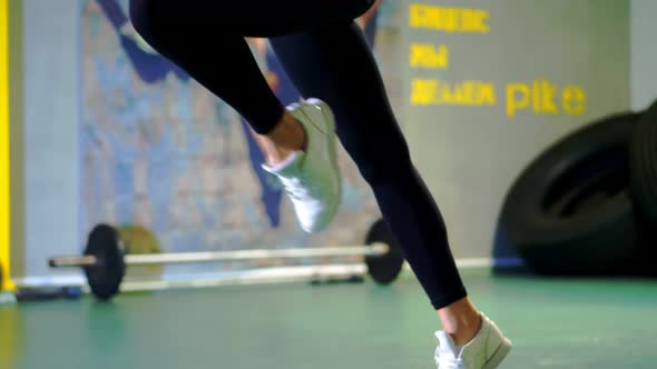 Training with Trx Fitness Straps in the Gym. Close-up, a Pregnant Young Woman, with a Large Belly