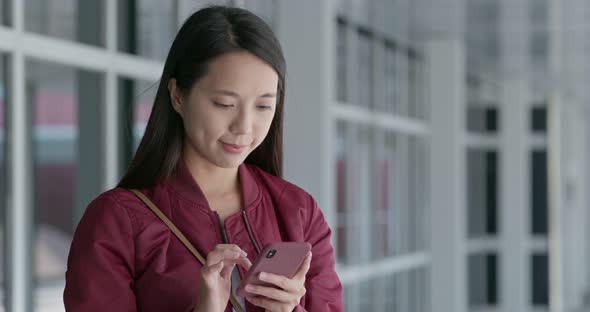 Woman check on smart phone at outdoor