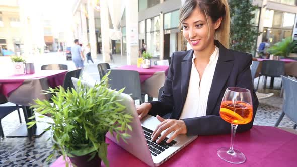 Businesswoman Having a Video Call during a Break