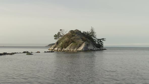 Aerial Panoramic View of Rocky Island on the Pacific Ocean West Coast