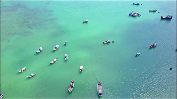 Aerial View Fishing Boats Float on Sea Surface By Coast