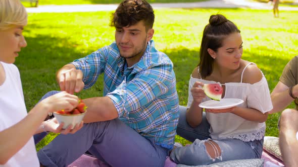  Friends Eating Fruits at Picnic in Summer Park 44