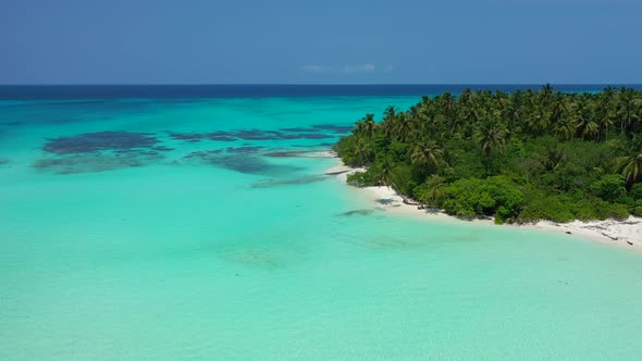 Natural overhead abstract view of a paradise sunny white sand beach and turquoise sea background 