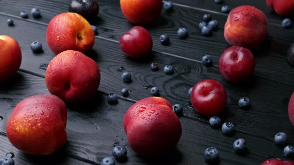 Nectarines Sweet Cherries Blueberries on a Wooden Table Autumn Fall Harvest in Summer