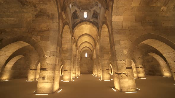 Interior of Historical Monumental Building With Stone Arches and Domes