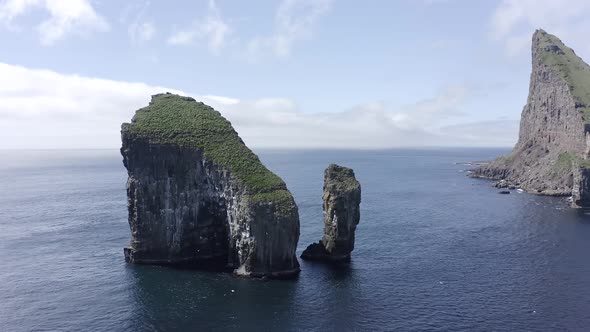 Aerial Drone View on Drangarnir Sea Stack in the Atlantic Ocean on the Faroe Islands
