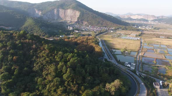 Mountain village and farmland in the sunset