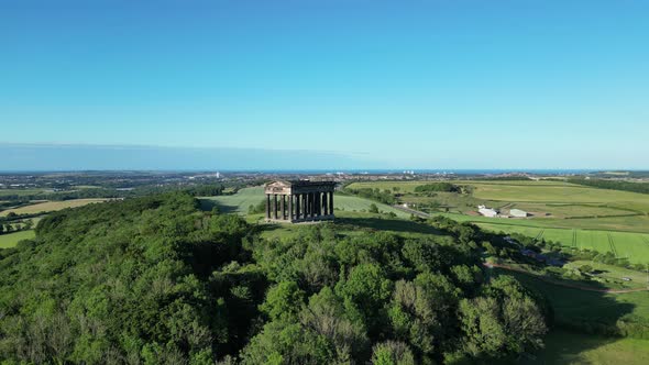 Aerial wide cinematic, push in on Penshaw Monument in Sunderland, North East, UK. 4K