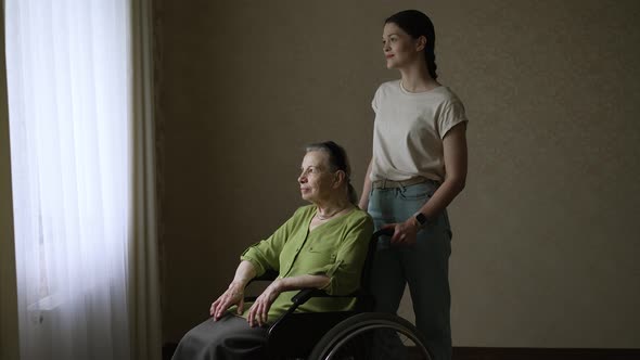 Senior Woman with Her Home Caregiver