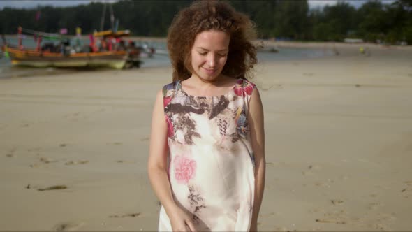 Peaceful Lady Walking on Idyllic Shore