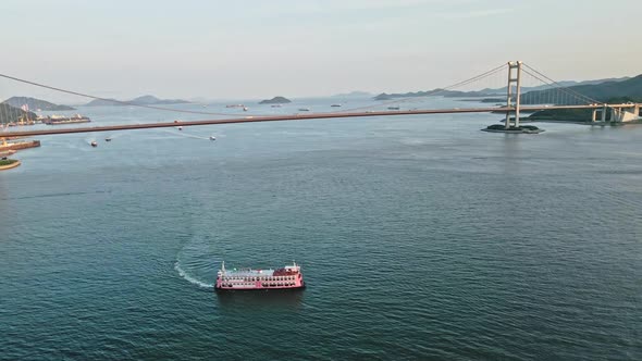 Traditional tourist ship near the Ting Kau Bridge in Tsuen Wan, Hong Kong