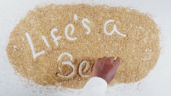 Hand Writes On Sand Lifes Beach 