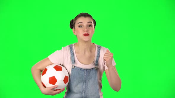 Girl with Football Ball, Cheers for His Favorite Team While Watching the Match Then Disappointed on