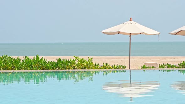 Outdoor swimming pool in hotel resort for vacation