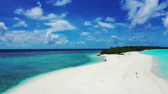 Girls sunbathing on exotic tourist beach trip by blue ocean and white sandy background of the Maldiv