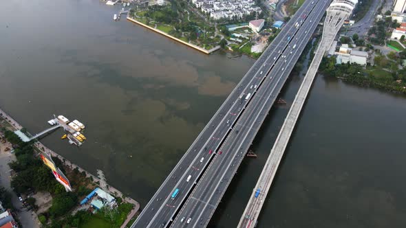 Aerial view overlooking Cau Sai Gon bridge revealing skyscrapers in the Phuong 22 district of Ho chi