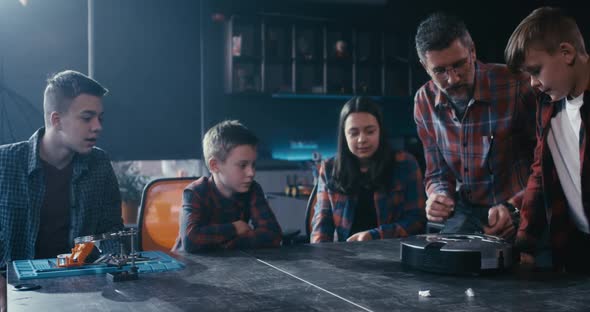 Teacher and Students Testing Robot