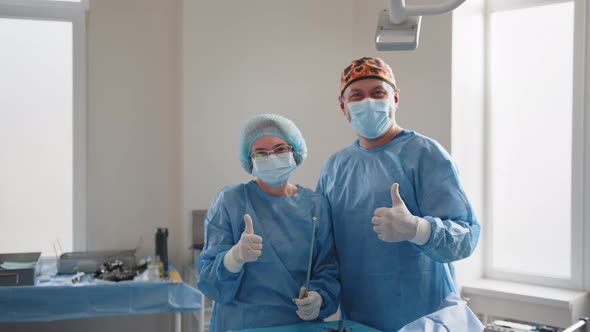 Surgery Medicine and People Concept Group of Surgeons in Operating Room at