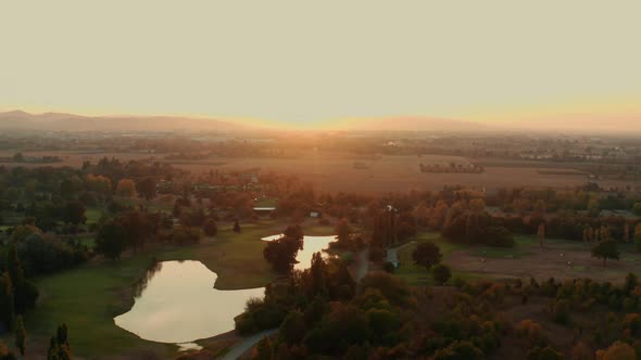 Aerial view of Italian north land and lake at sunset sky