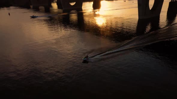 Aerial Top View of the Man Driving Water Scooter on the River