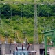 Power Lines Go Up the Mountain From the Hydroelectric Plant Transformer - VideoHive Item for Sale