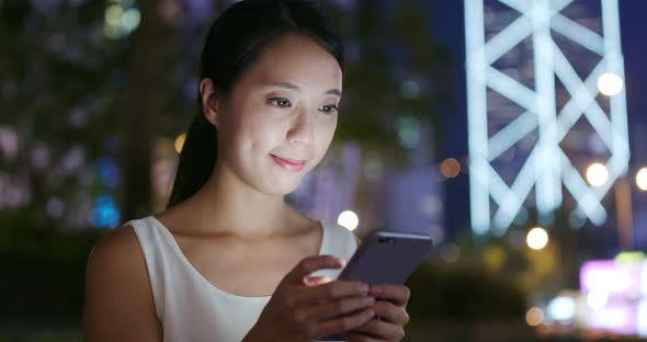 Woman Use of Mobile Phone for Online