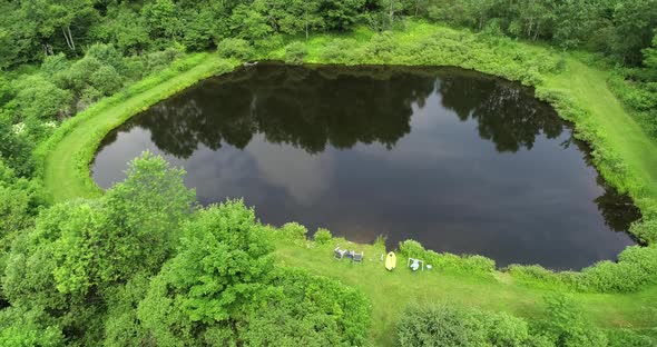 A small drone orbit of a private fishing pond in the Catskill mountains.