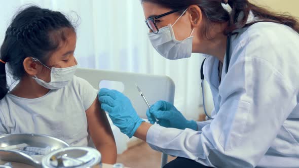 School Girl Visits Skillful Doctor at Hospital for Vaccination