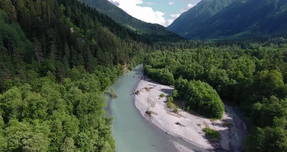 Drone Flying Over a Mountain River in the Green Mountains