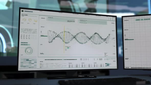 Computer on a desk. DNA analysis. DNA cell count. Data appearing on screen