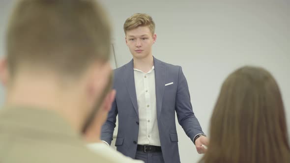 Portrait Handsome Successful Confident Businessman Presenting New Project To Partners with Flip