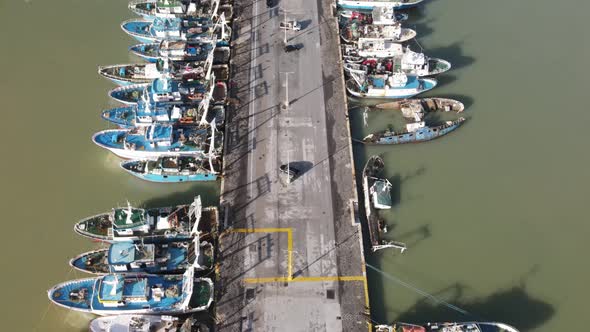 Fishing Boats in a Small Port Aerial Overhead View From Drone