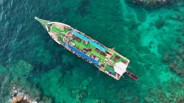 A large yacht stands at sea aerial view 4 K Turkey Alanya