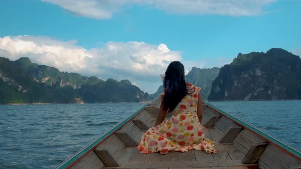 Khao Sok Thailand Woman on Vacation in Thailand Girl in Longtail Boat at the Khao Sok National Park