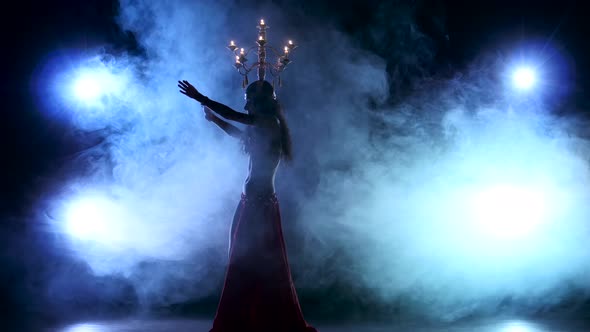 Attractive Belly Dancer Starts Dancing with Candles on Her Head, Black, Smoke, Silhouette