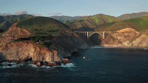 Scenic Bridge at the Pure Nature of Big Sur.  Mountains on Motion Background