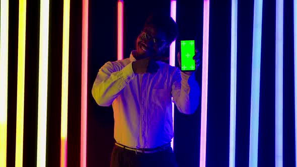 Portrait Young Stylish Male African American Smiling Showing Smartphone Green Screen Chroma Key