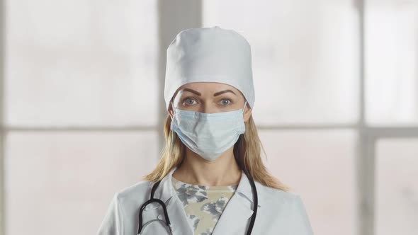 Portrait of a smiling lady doctor looking at camera