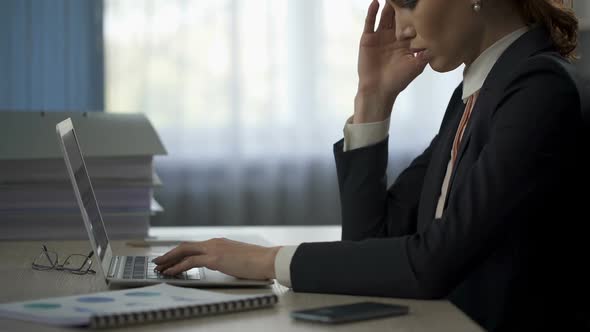 Female Employee Typing on Laptop, Working Hard and Making Gross Error, Failed