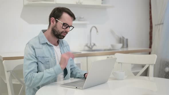 Tired Beard Young Man Having Neck Pain in Office