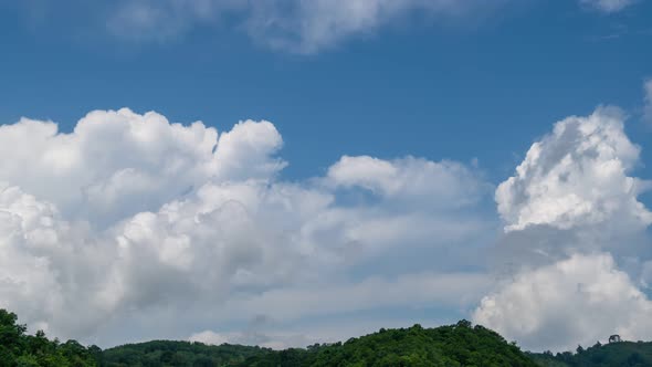 4K Amazing timelapse video of clouds. Blue sky white clouds. Fluffy white clouds. Cumulus cloud